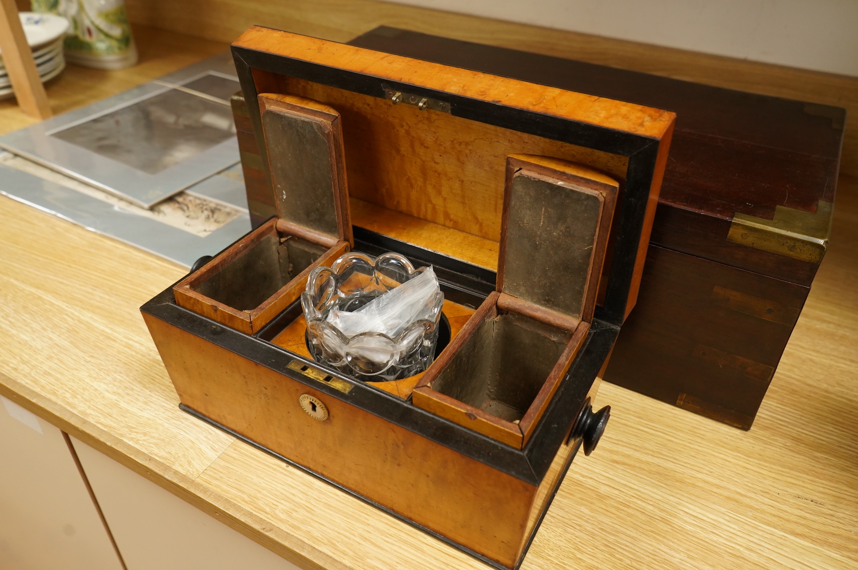 A bird’s-eye maple tea caddy and a brass mounted writing slope, latter 50cm wide